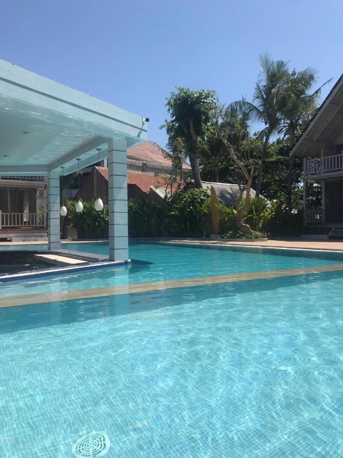 Апарт отель Seminyak Beach Hut Экстерьер фото