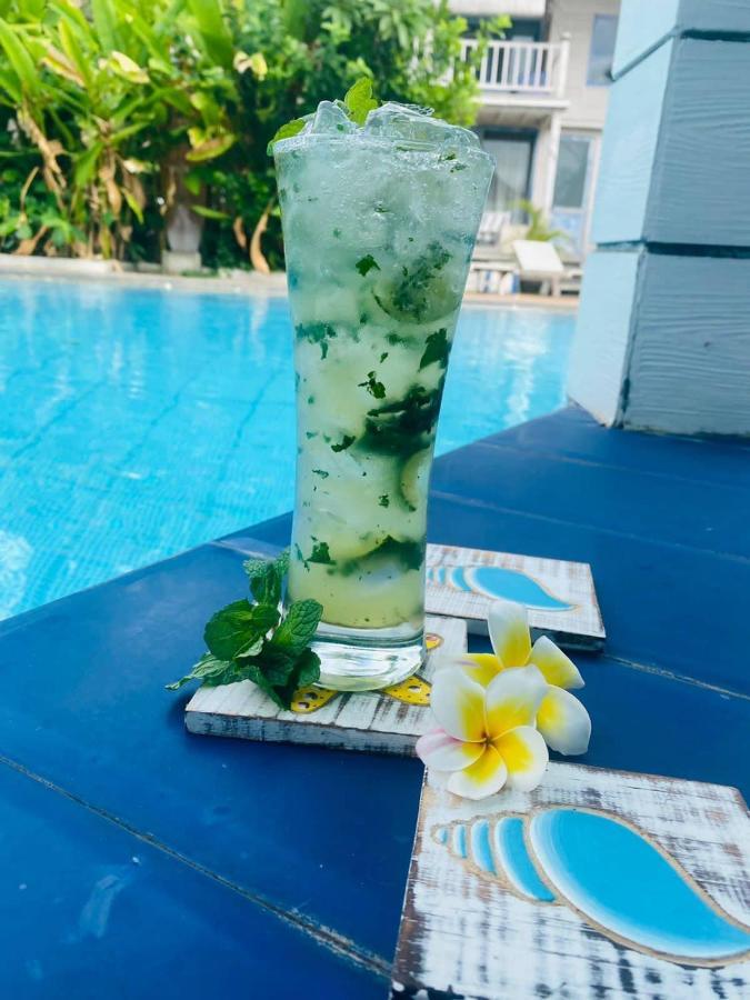 Апарт отель Seminyak Beach Hut Экстерьер фото